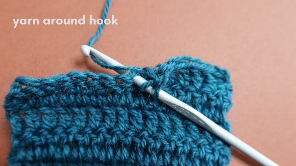 Close up of treble crochet stitch tutorial Step 3.