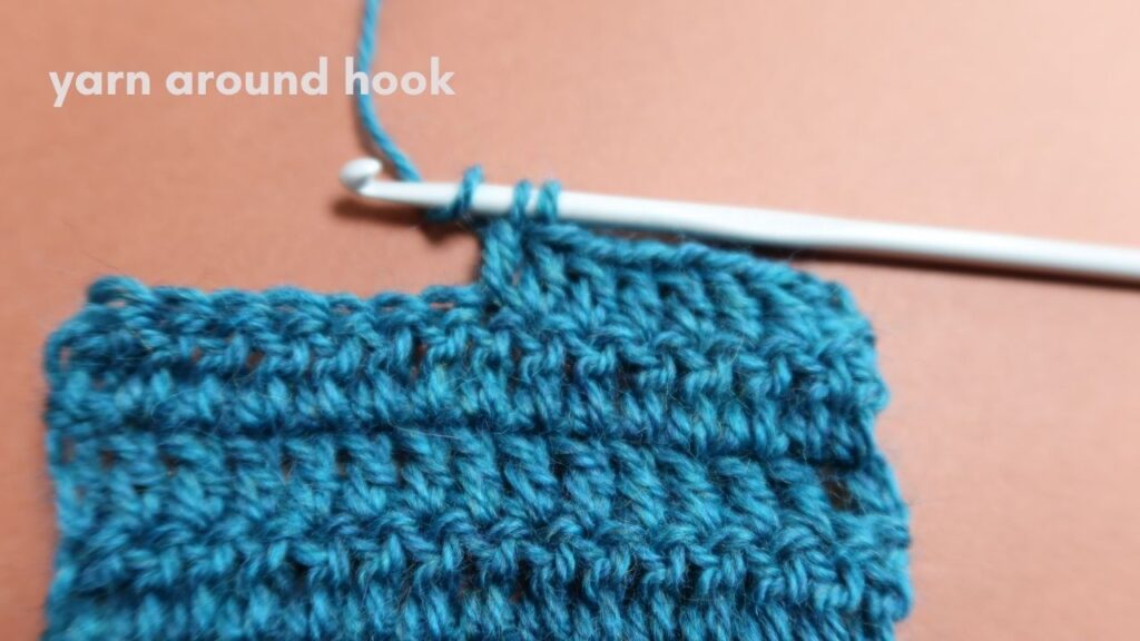 Close up of treble crochet stitch tutorial Step 7.