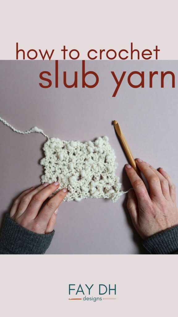 Crochet swatch of cream jumbo boucle yarn with a bamboo crochet hook and my hands in frame.