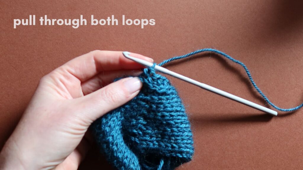 Close up of a starting half treble crochet in the third loop.