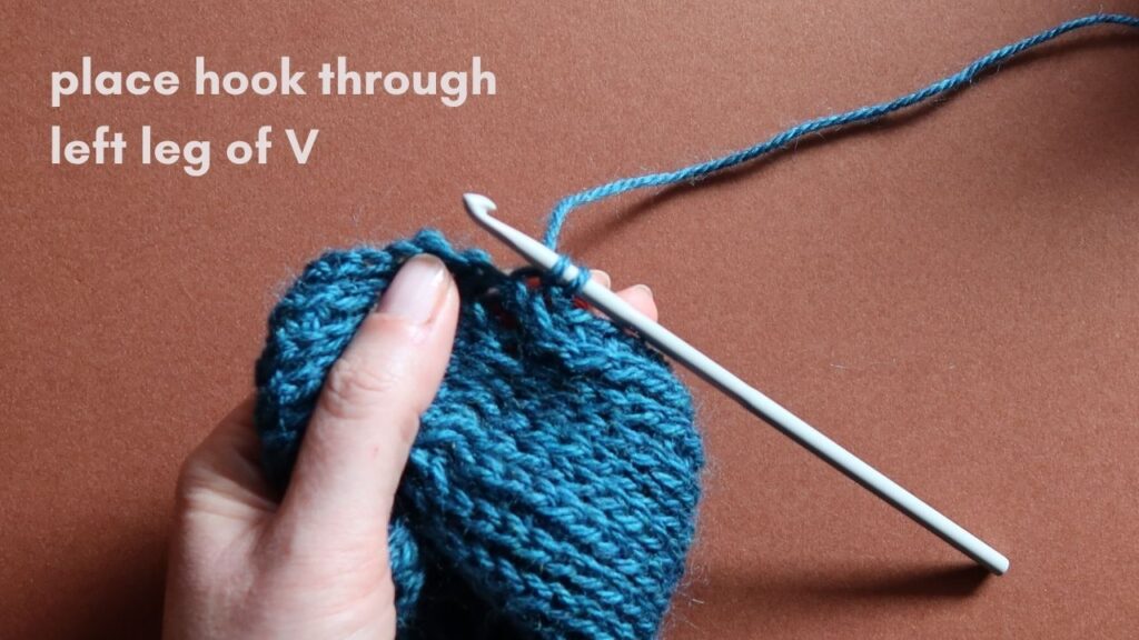 Close up of a starting half treble crochet in the third loop.