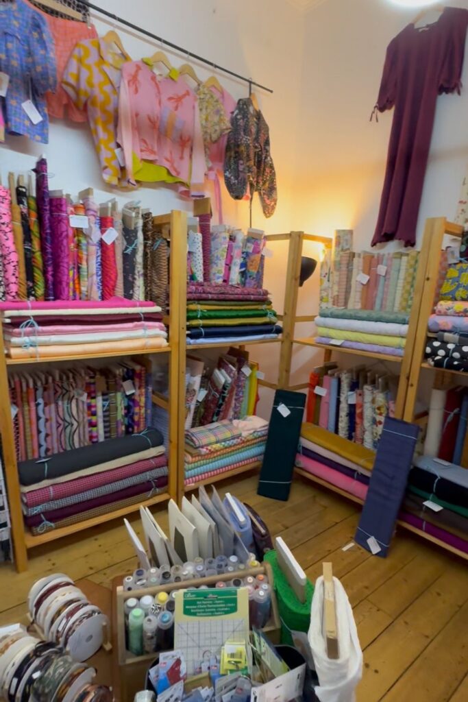 Rolls of fabrics and notions in the back room at Ginger Twist Studio, Edinburgh. 
