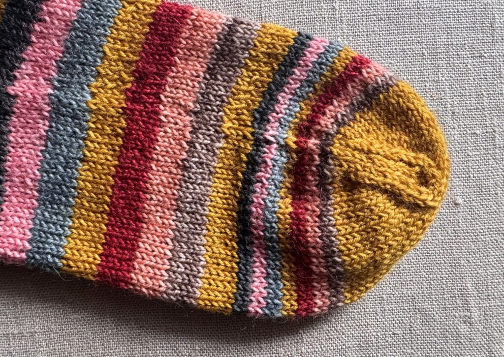 Toe of striped socks with 5 and 2 colour stripes.