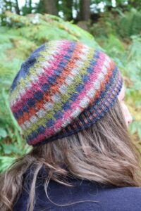 Colourwork knitted hat with block design.