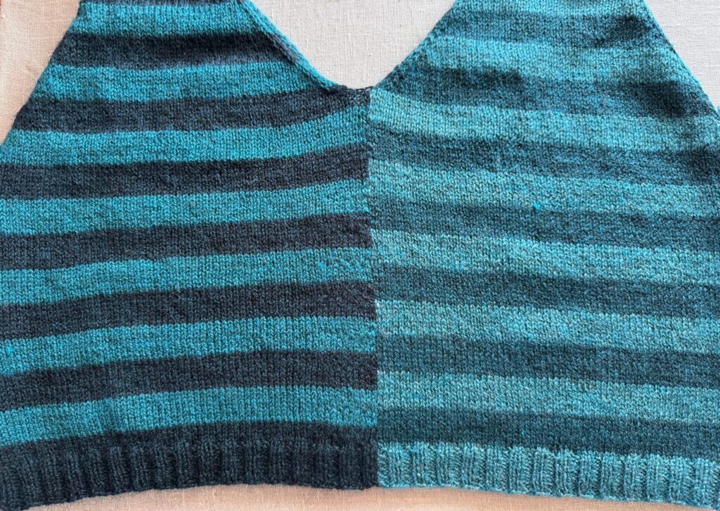 Knitted fabric showing seamless yarn colour changes, no ends to weave in.