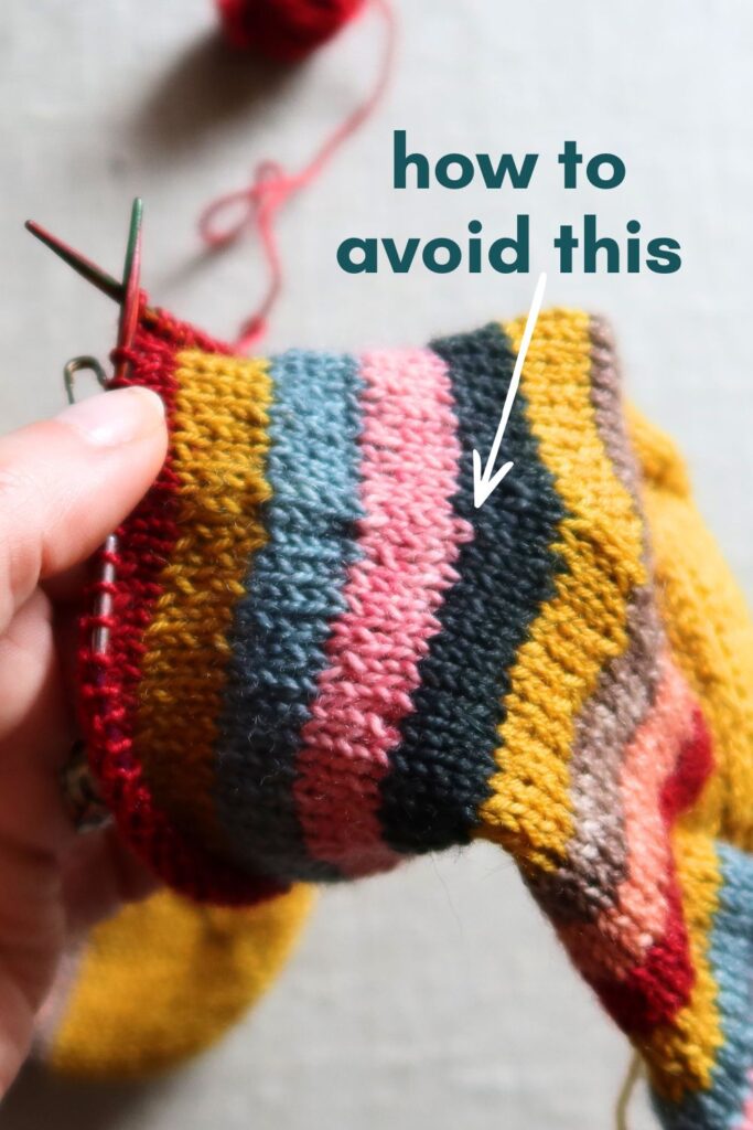 Close up of stripy trainer socks being knitted.